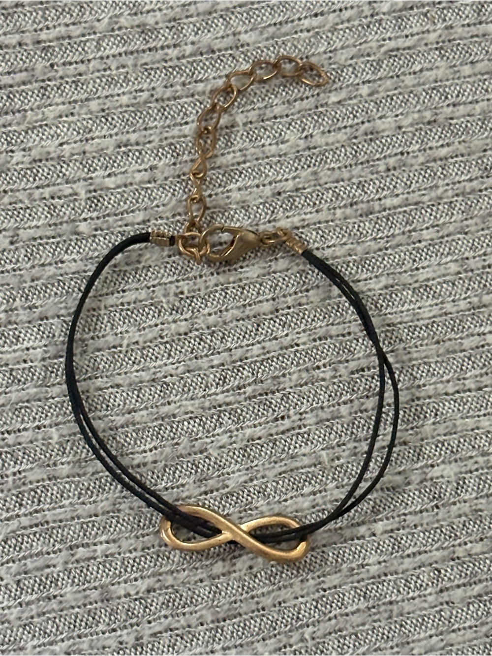 Y2K theme gold tone infinity symbol on 2-stranded black cord adjustable bracelet